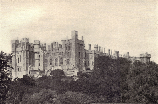 Black and white photograph of Arundel Castle, England, twelfth century on a wooded hill, taken in the late 19th century.