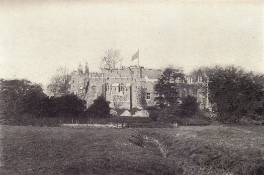 Black and white photograph of Berkeley Castle in England, taken in the late 19th century.