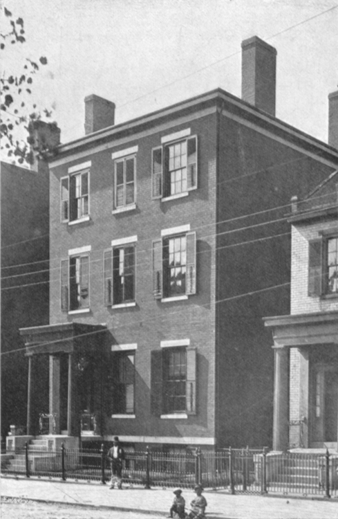 Black and white photograph of a three story square house, that Robert E. Lee stayed in when he was in Richmond, Virginia.