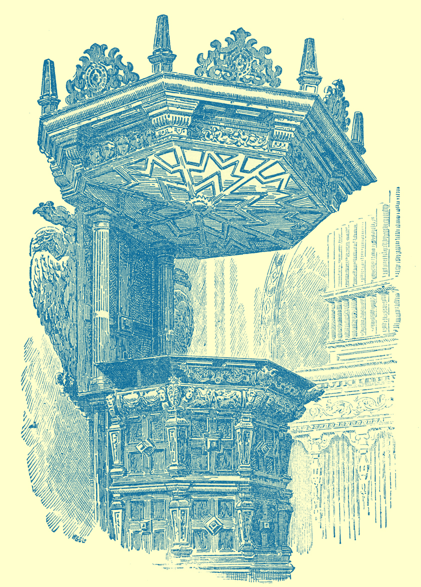 A carved oak pulpit with a canopy, or sounding board.  Very ornate.