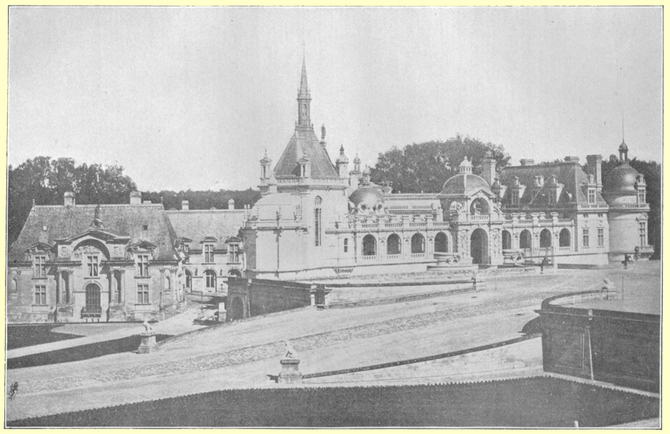 A black and white photograph of a the Chateau de Chantilly, France.