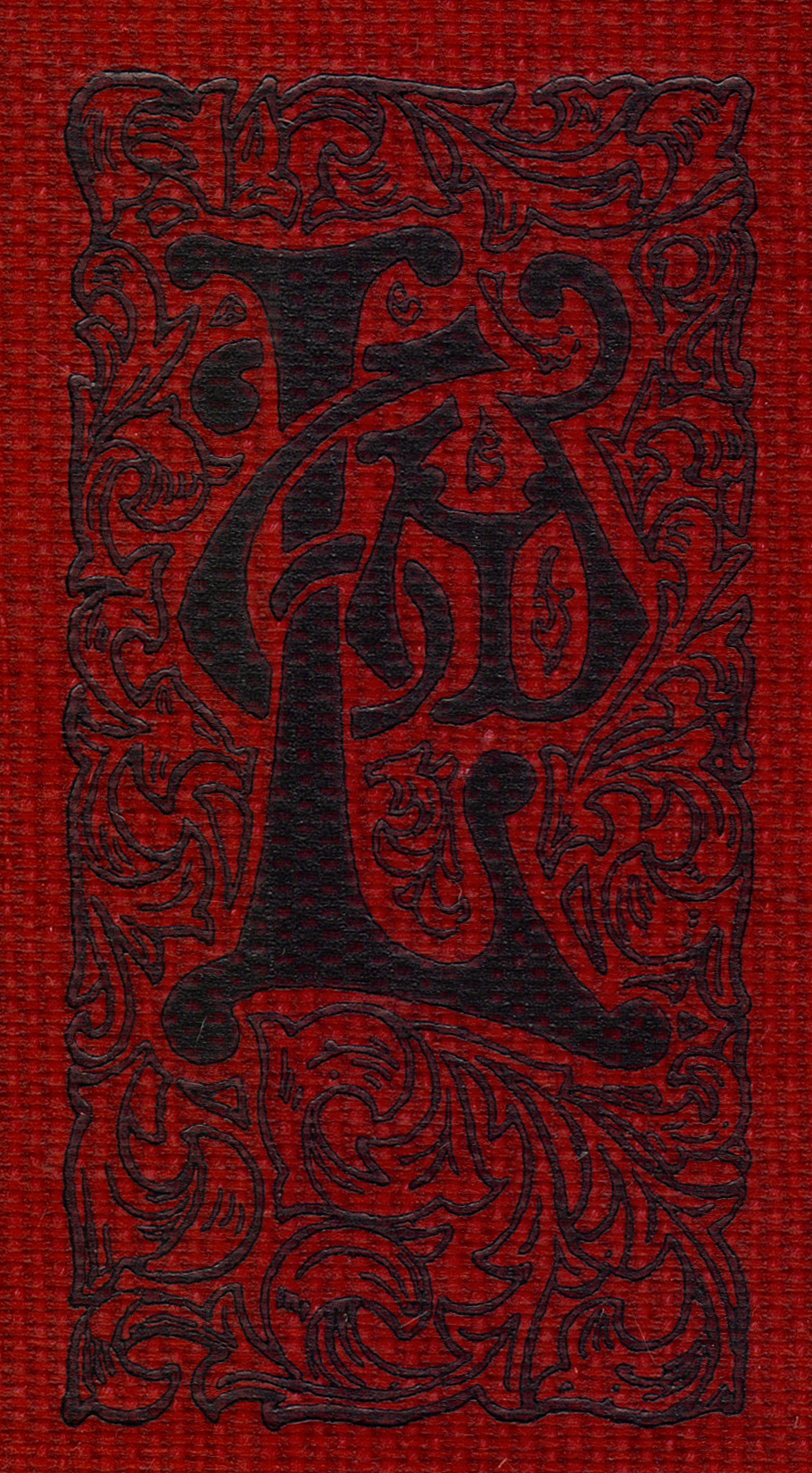 Black Decorated Monogram spelling LTD from the back of the book, on a burgundy woven ground.